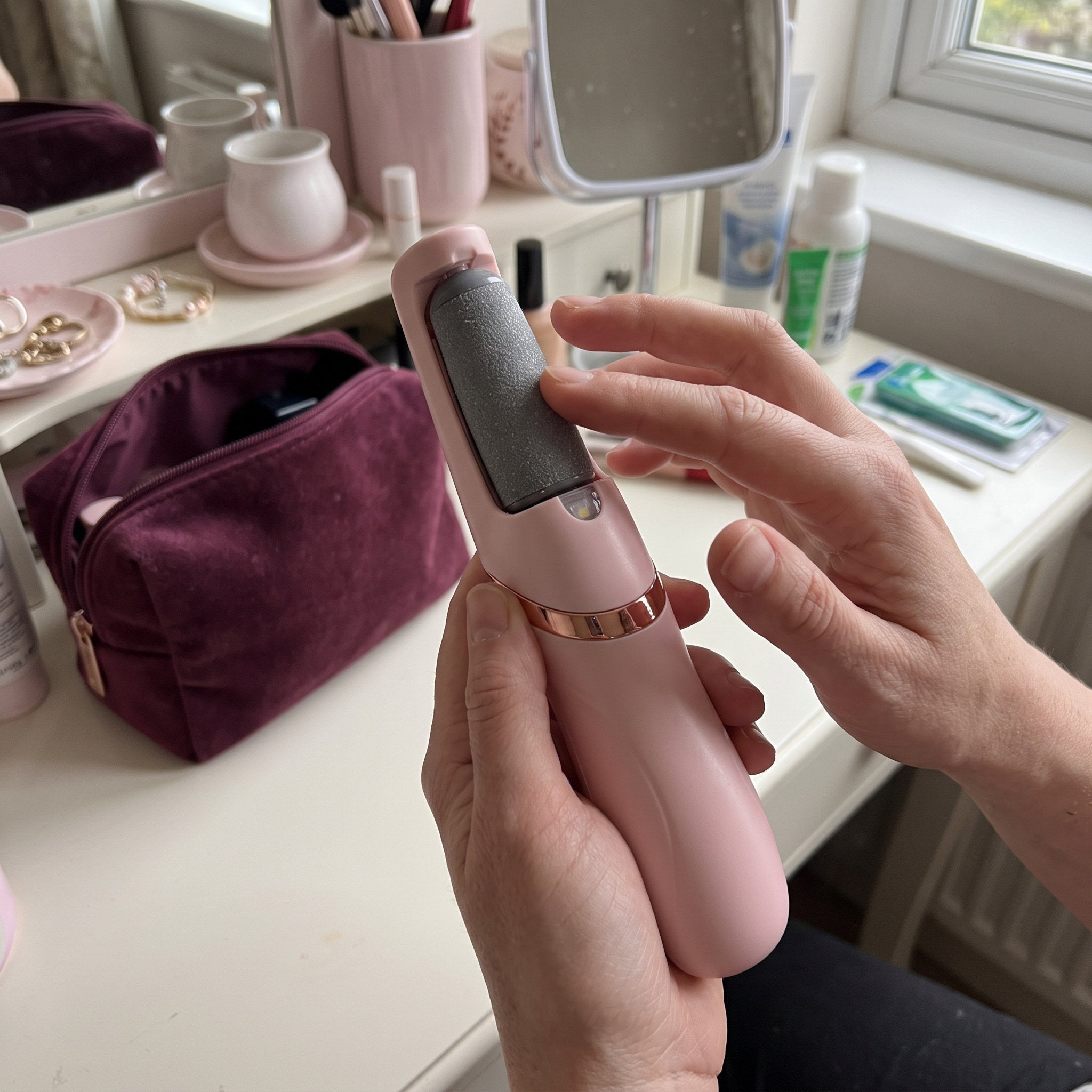 Fingers Holding The Attached Dry Roller At A Dresser
